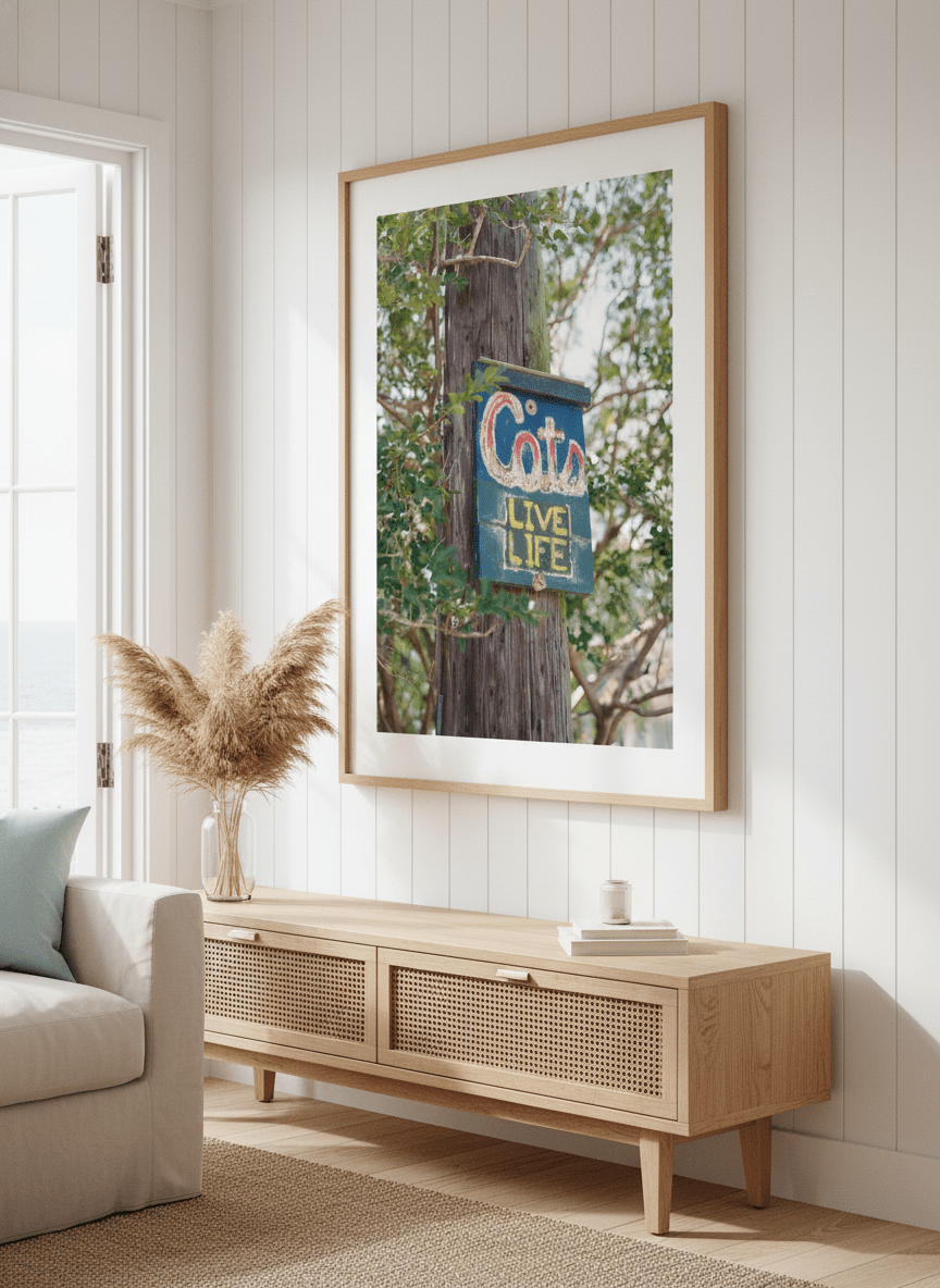 Neutral wall art displayed in a sunny coastal beach house