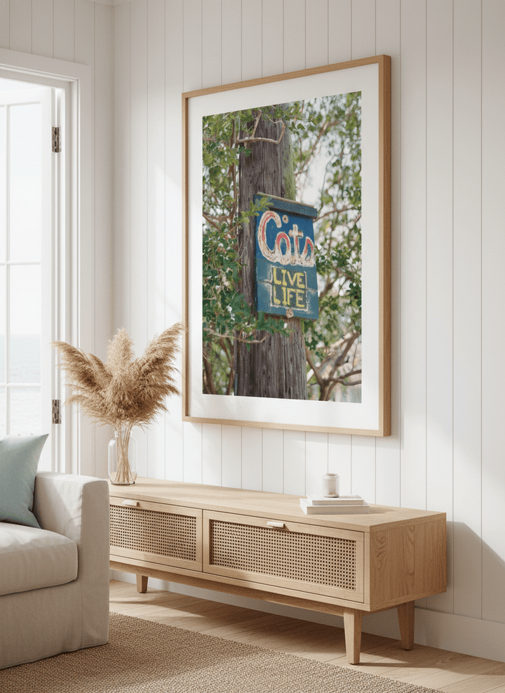 Neutral wall art displayed in a sunny coastal beach house
