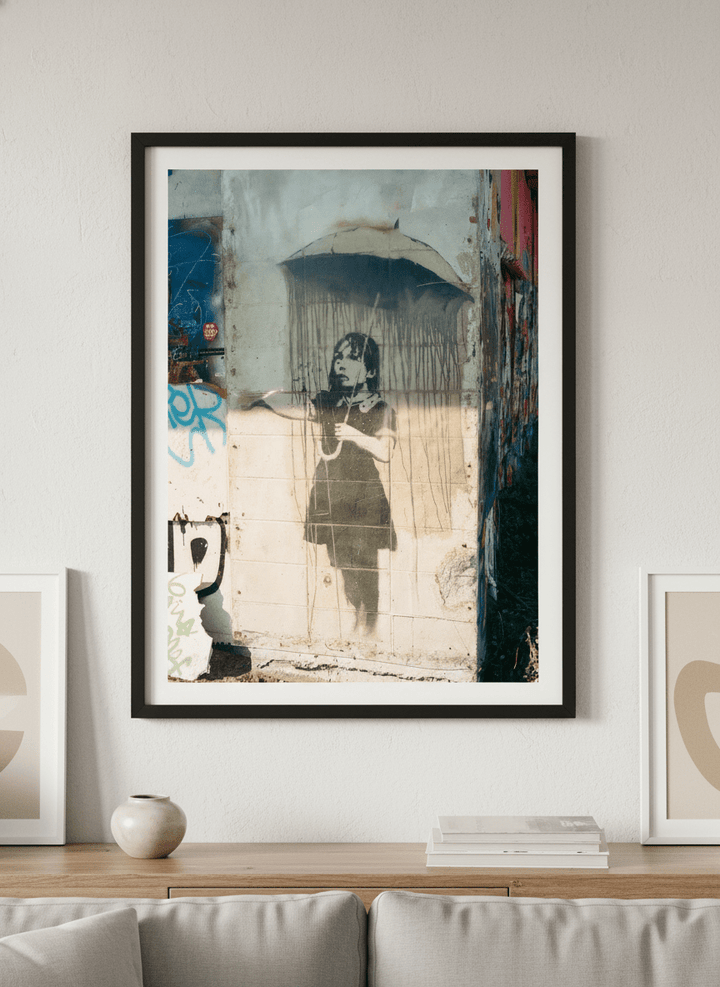 Modern wall art styled above a sofa in a neutral living room