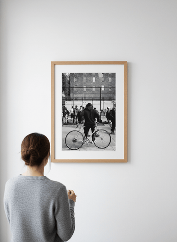 Person showcasing the artwork against a clean modern interior wall