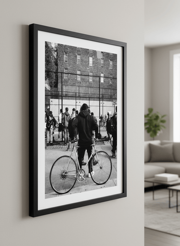 Modern wall art styled above a sofa in a neutral living room