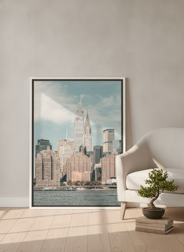 Canvas wall art with a white surround leaning against the wall in a warm Japandi home office