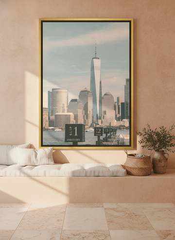 Oversized statement canvas wall art with a gold leaf surround styled on the wall in a Mediterranean living room