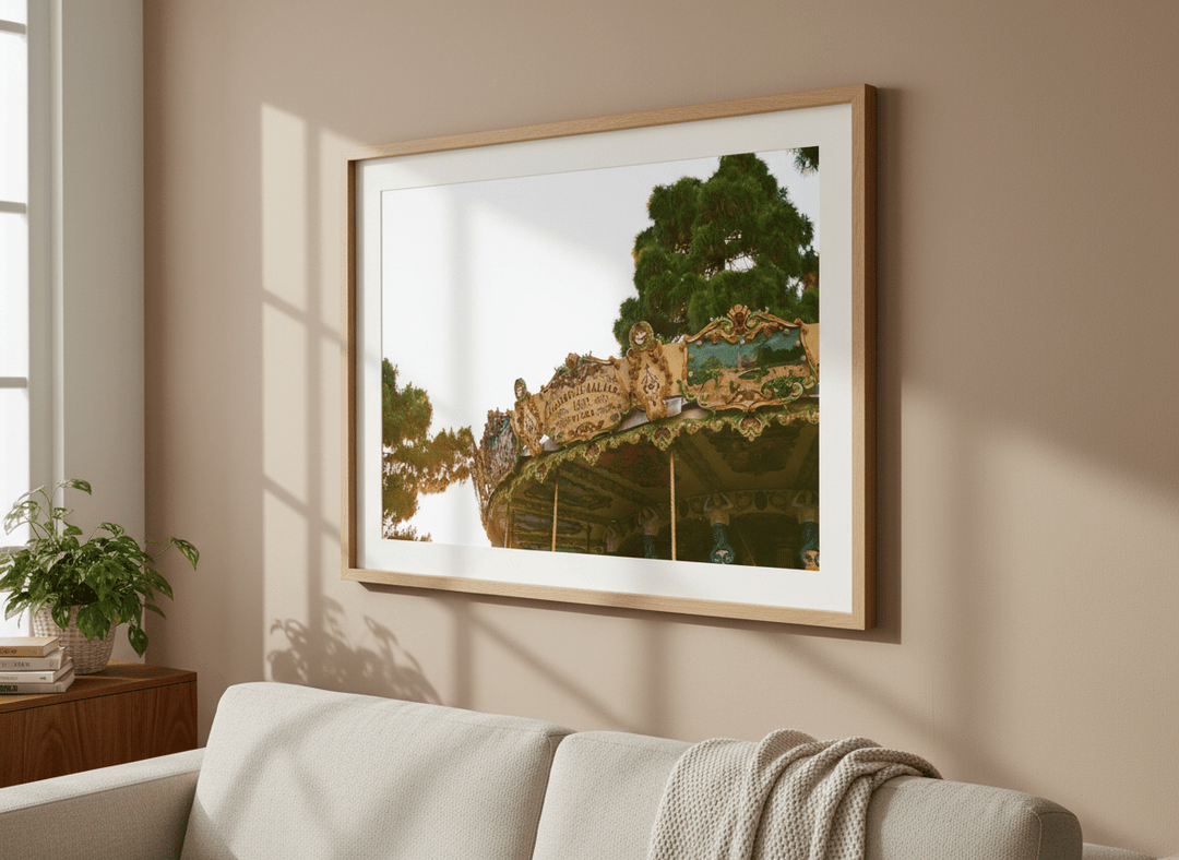 Modern wall art styled above a sofa in a neutral living room