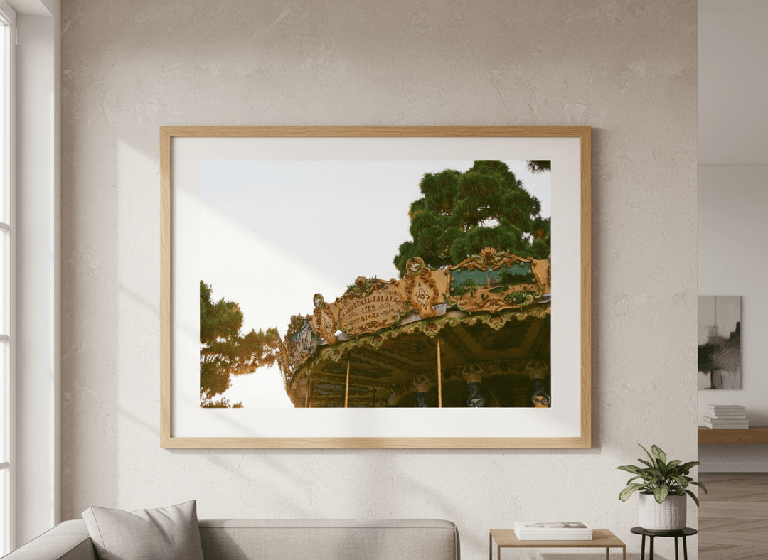 Modern wall art styled above a sofa in a neutral living room