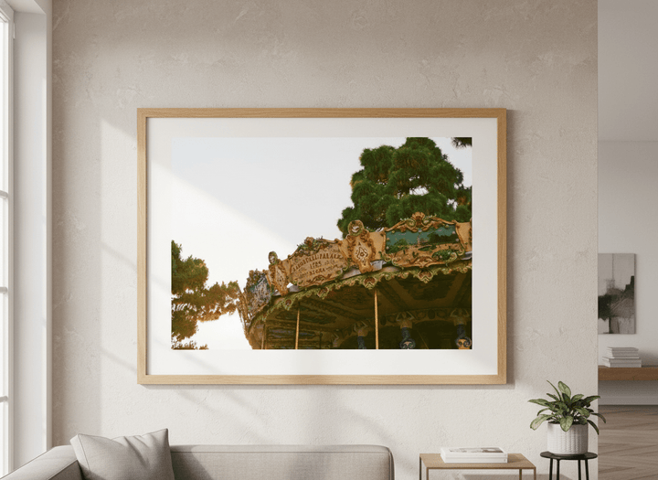 Modern wall art styled above a sofa in a neutral living room