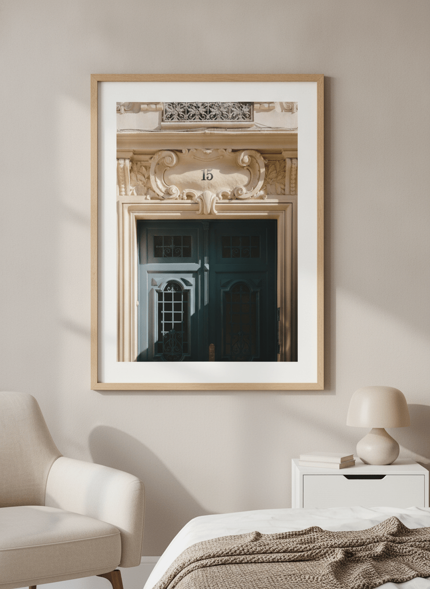 Minimalist artwork displayed in a calm, light-filled bedroom interior