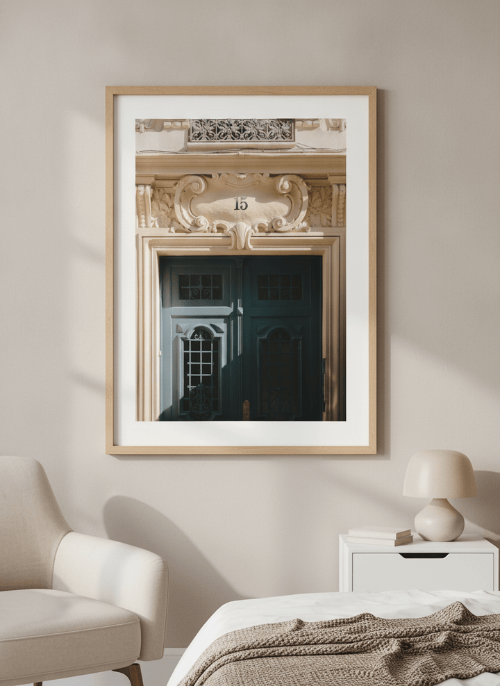 Minimalist artwork displayed in a calm, light-filled bedroom interior