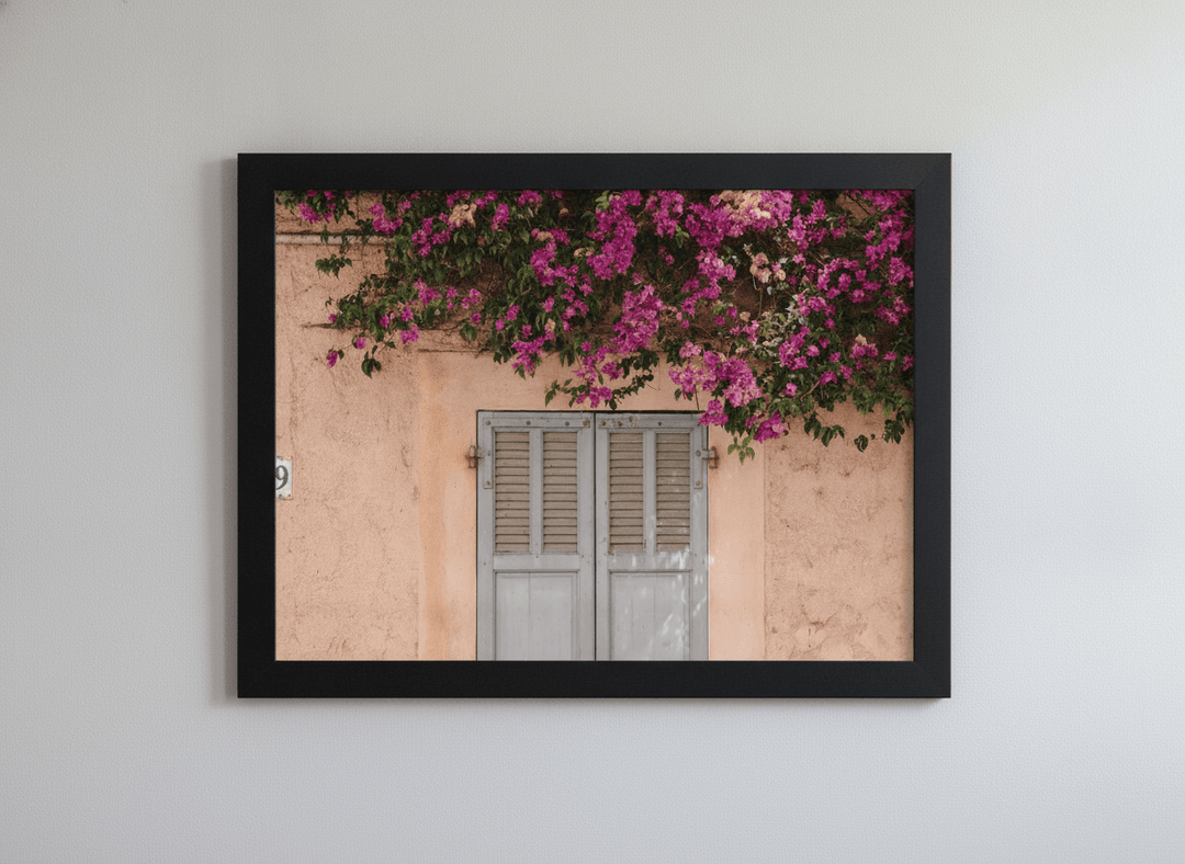 Minimalist artwork displayed in a calm, light-filled bedroom interior