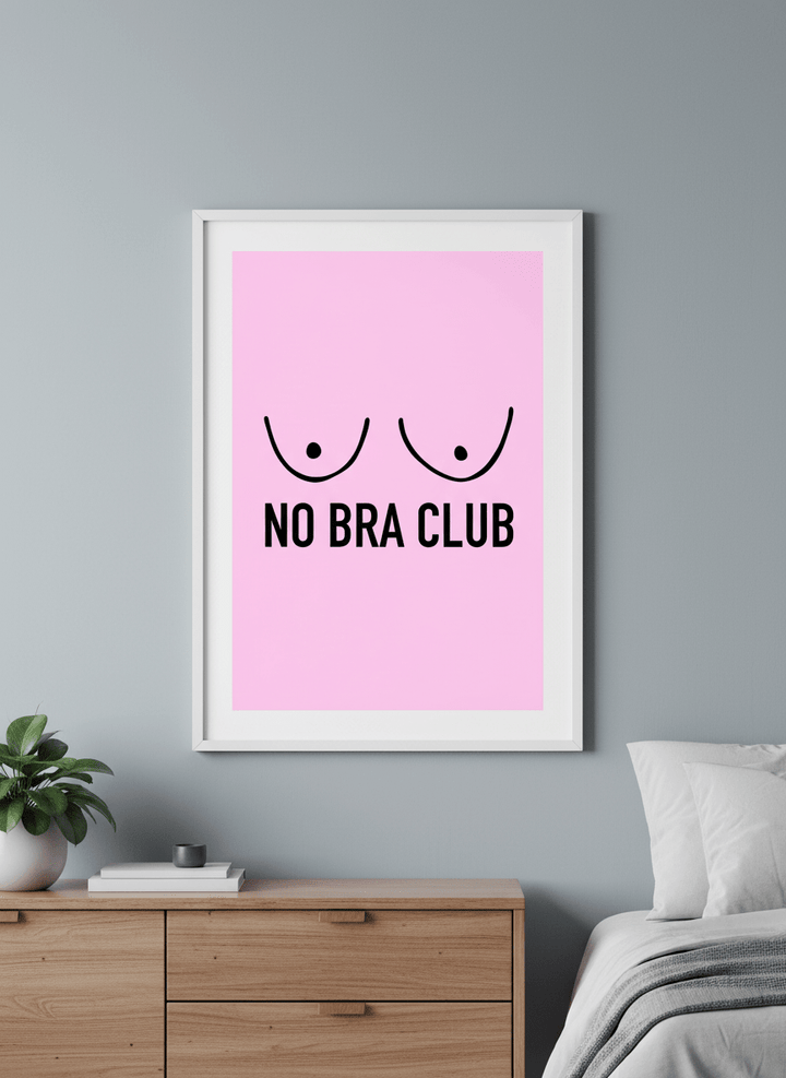 Minimalist artwork displayed in a calm, light-filled bedroom interior