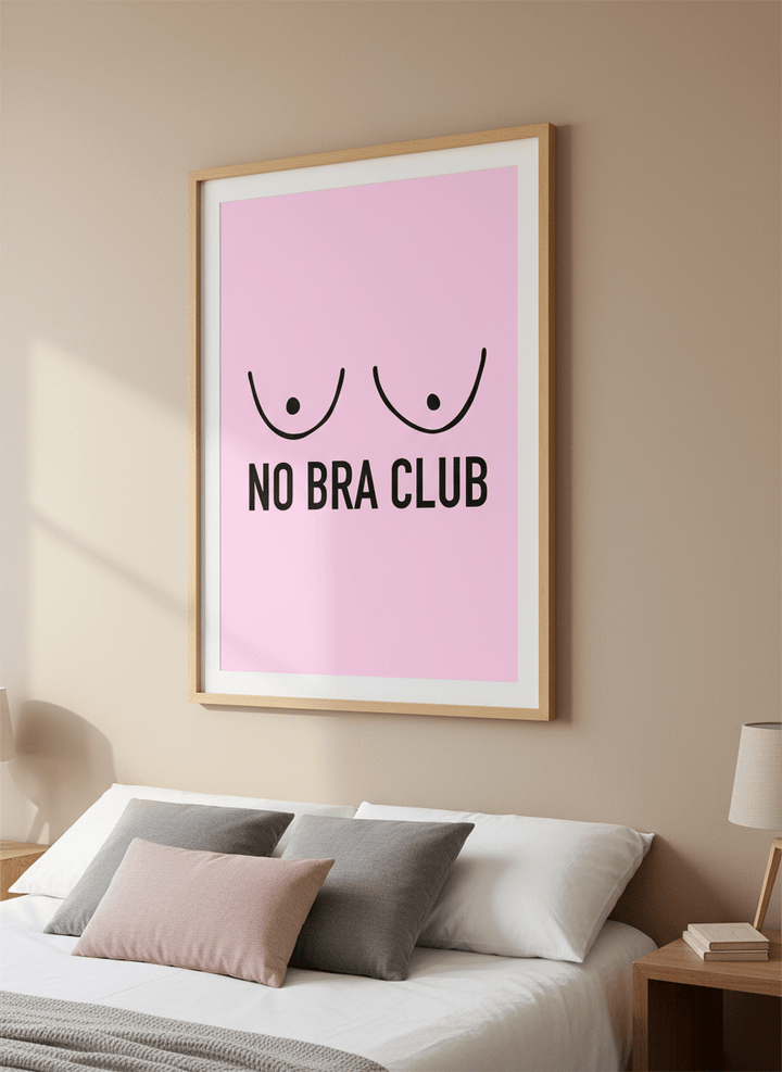 Minimalist artwork displayed in a calm, light-filled bedroom interior
