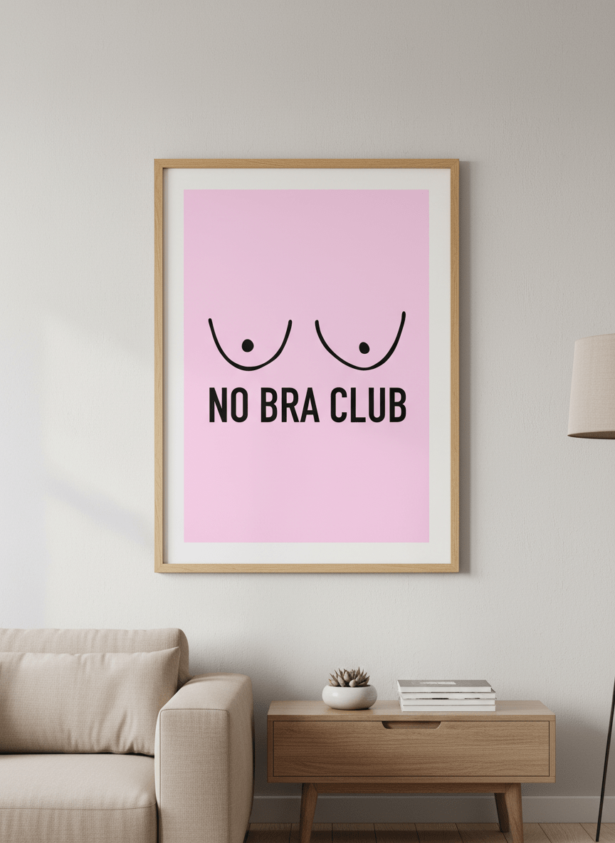 Modern wall art styled above a sofa in a neutral living room