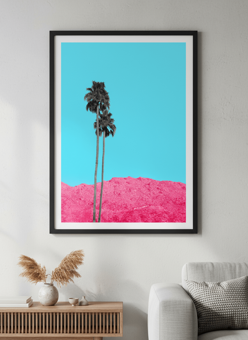 Modern wall art styled above a sofa in a neutral living room