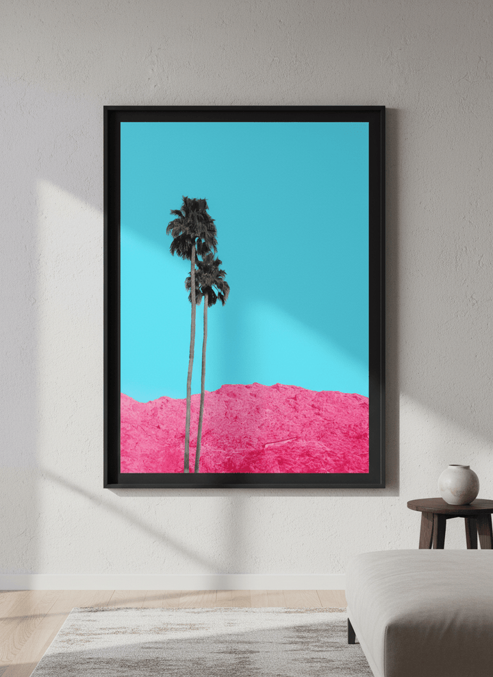 Modern wall art styled above a sofa in a neutral living room