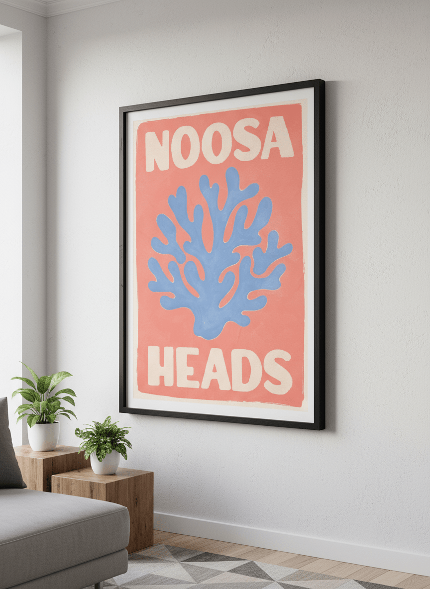 Modern wall art styled above a sofa in a neutral living room