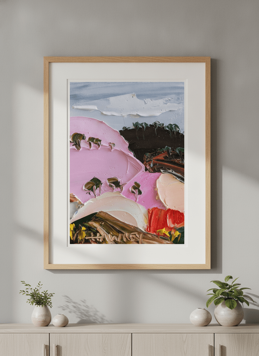 Modern wall art styled above a sofa in a neutral living room