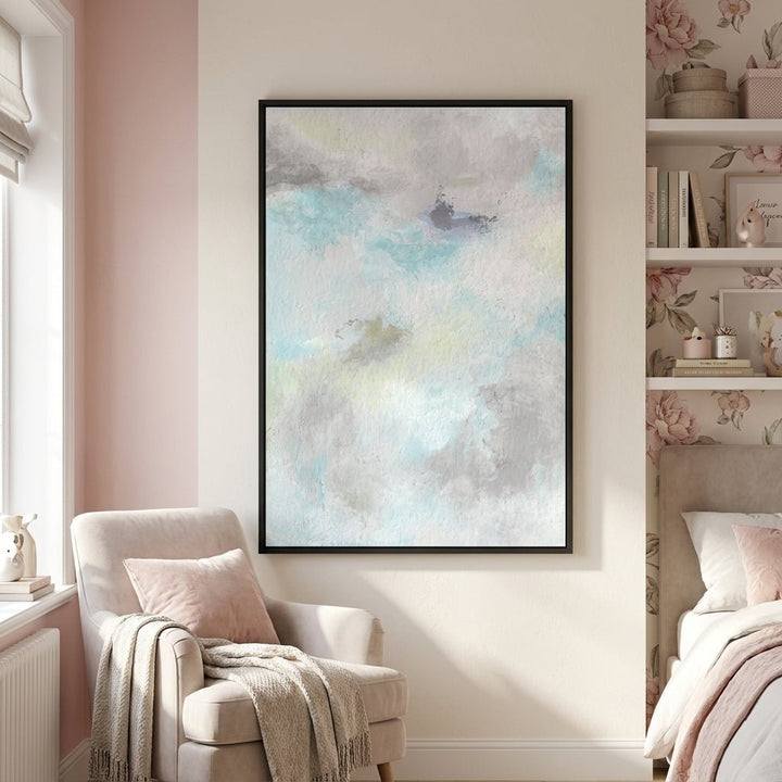 abstract artwork in a living room with a chair and bookshelf.