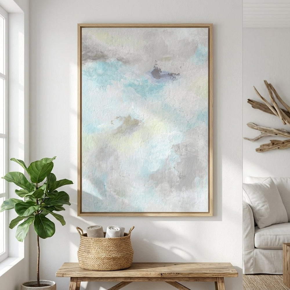 abstract painting on a wall in a living room with a plant and bench.