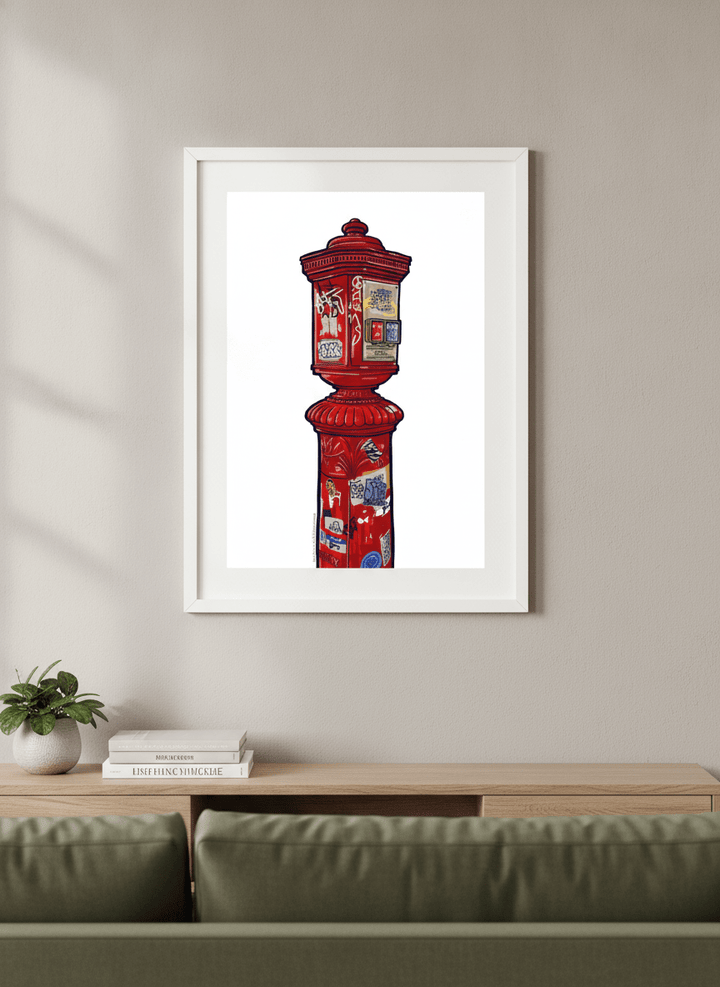 Modern wall art styled above a sofa in a neutral living room