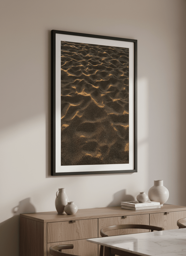 Wall art styled above a dining table in a contemporary home