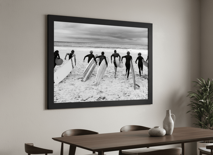 Wall art styled above a dining table in a contemporary home