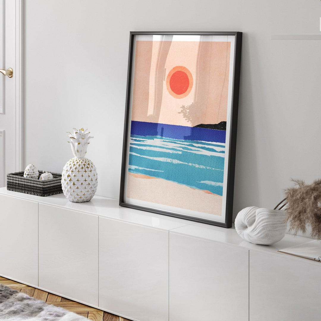 artwork on top of white cabinet