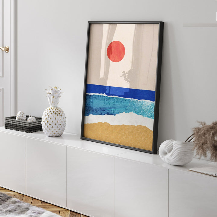 ocean artwork on top of white console