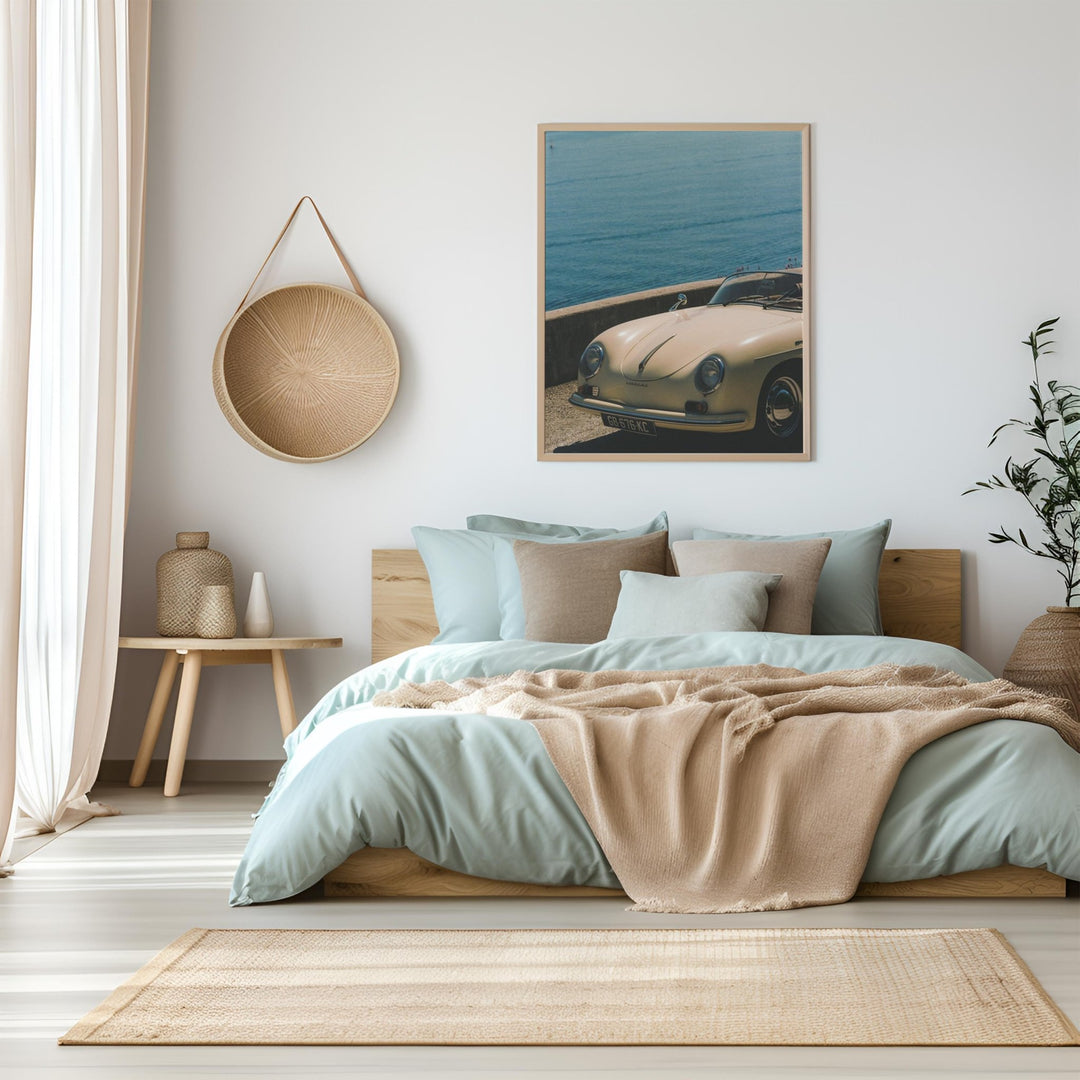 photo of a white car hanged over a coastal beige bed