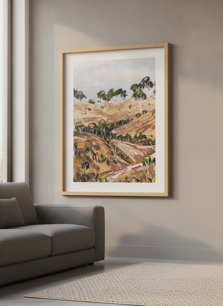 Modern wall art styled above a sofa in a neutral living room