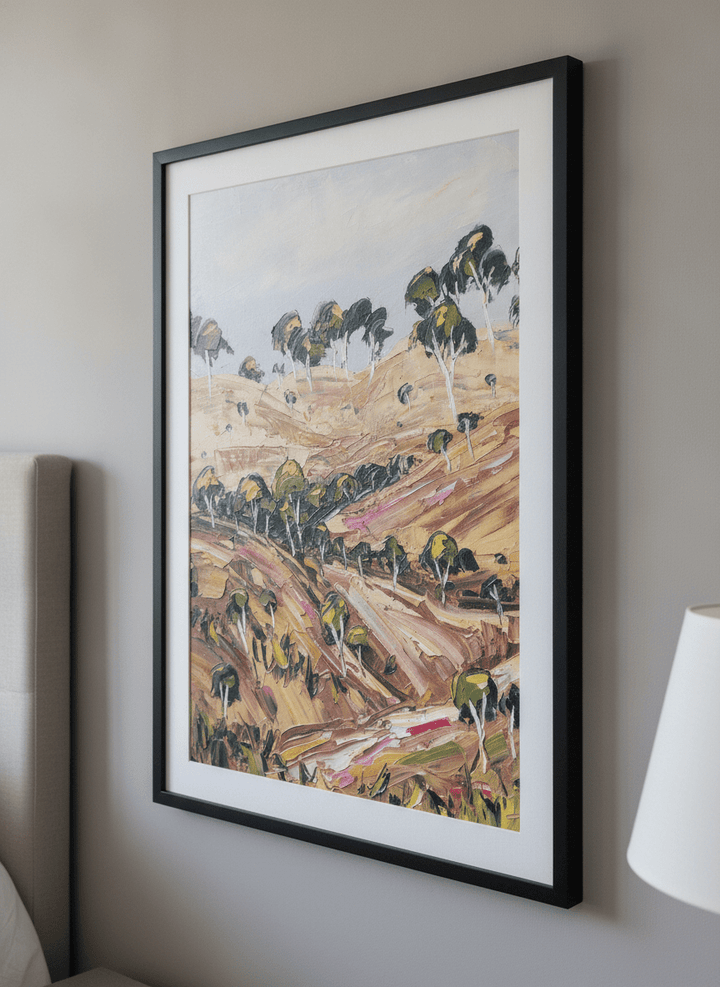 Minimalist artwork displayed in a calm, light-filled bedroom interior