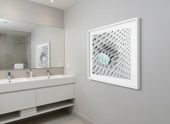 Modern print displayed in a clean minimalist bathroom setting