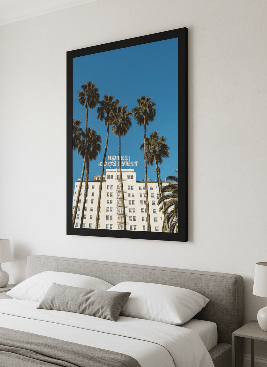 Minimalist artwork displayed in a calm, light-filled bedroom interior