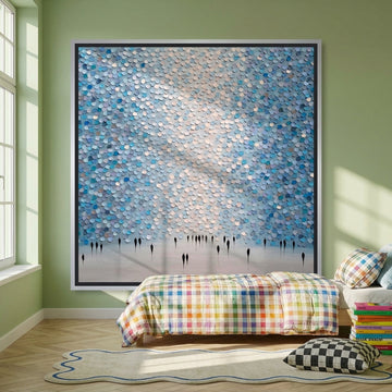 Canvas wall art with a silver leaf surround styled on the wall in a colourful eclectic bedroom