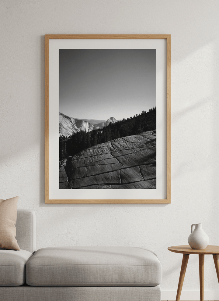 Modern wall art styled above a sofa in a neutral living room