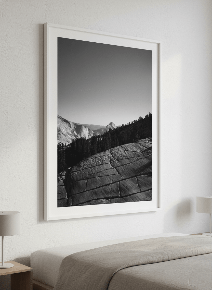 Minimalist artwork displayed in a calm, light-filled bedroom interior