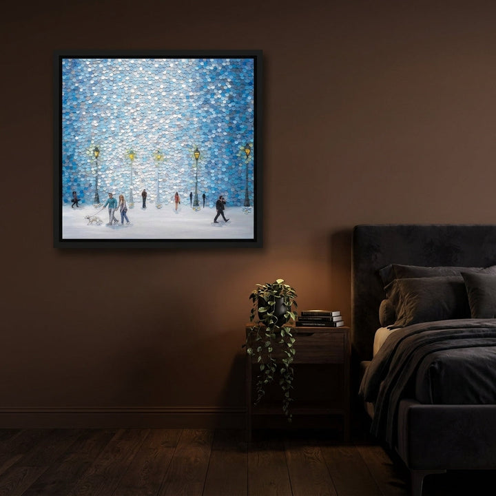 Canvas wall art with a black surround styled on the wall in a moody bedroom
