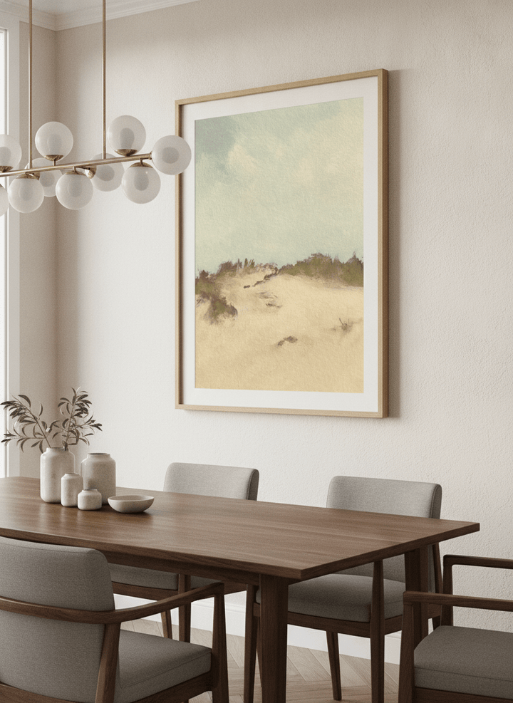 Wall art styled above a dining table in a contemporary home