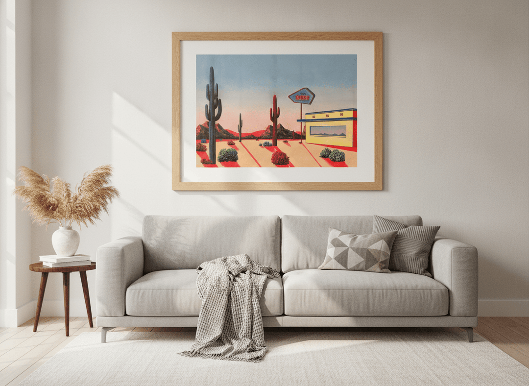 Modern wall art styled above a sofa in a neutral living room