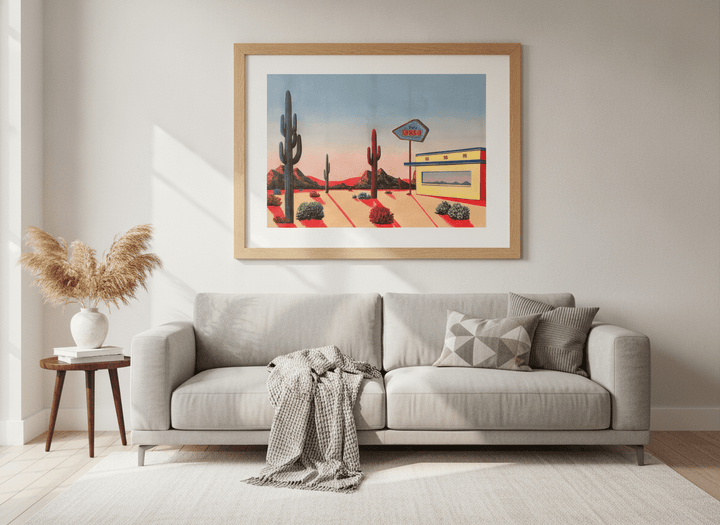 Modern wall art styled above a sofa in a neutral living room