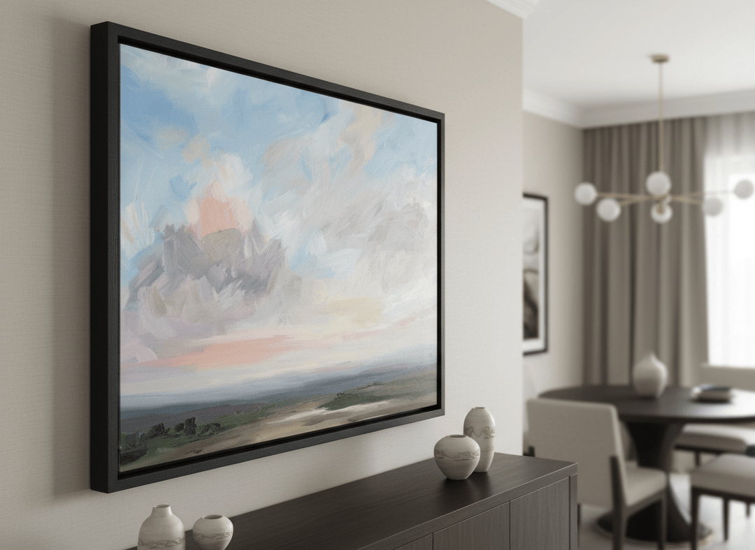 Wall art styled above a dining table in a contemporary home