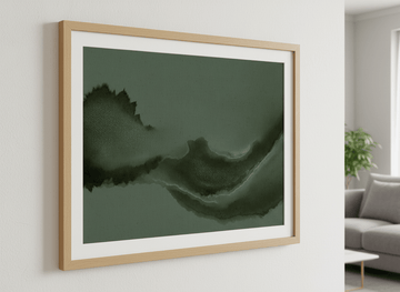 Modern wall art styled above a sofa in a neutral living room