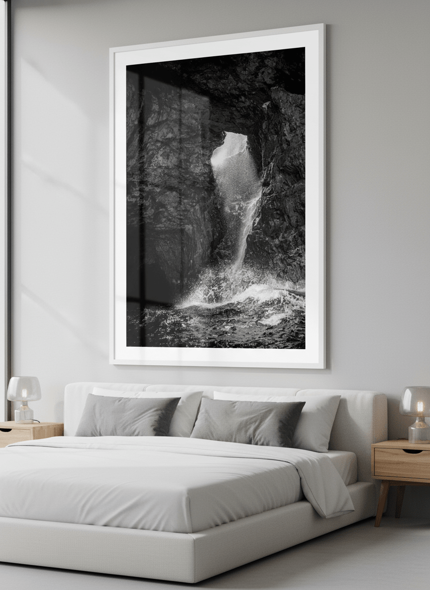 Minimalist artwork displayed in a calm, light-filled bedroom interior