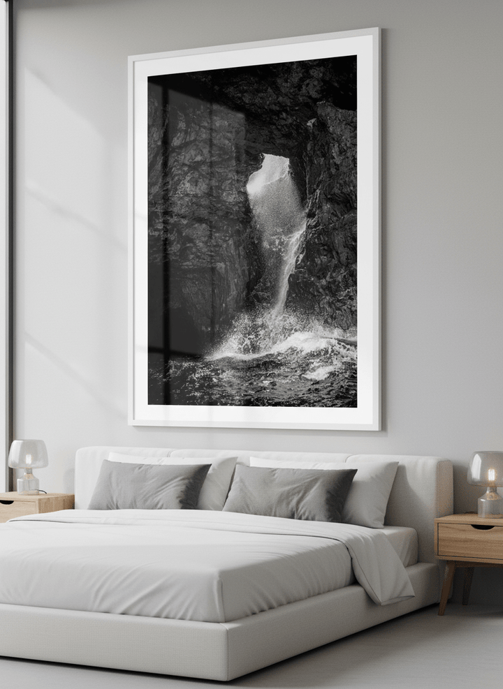 Minimalist artwork displayed in a calm, light-filled bedroom interior