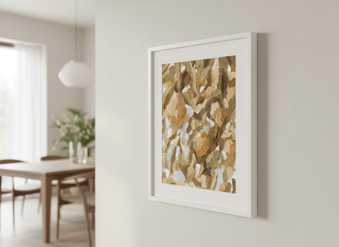 Wall art styled above a dining table in a contemporary home
