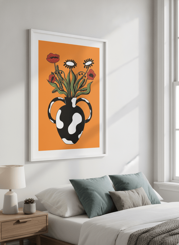 Minimalist artwork displayed in a calm, light-filled bedroom interior