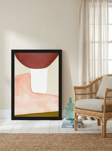 Modern wall art print leaning against the wall in a coastal living room