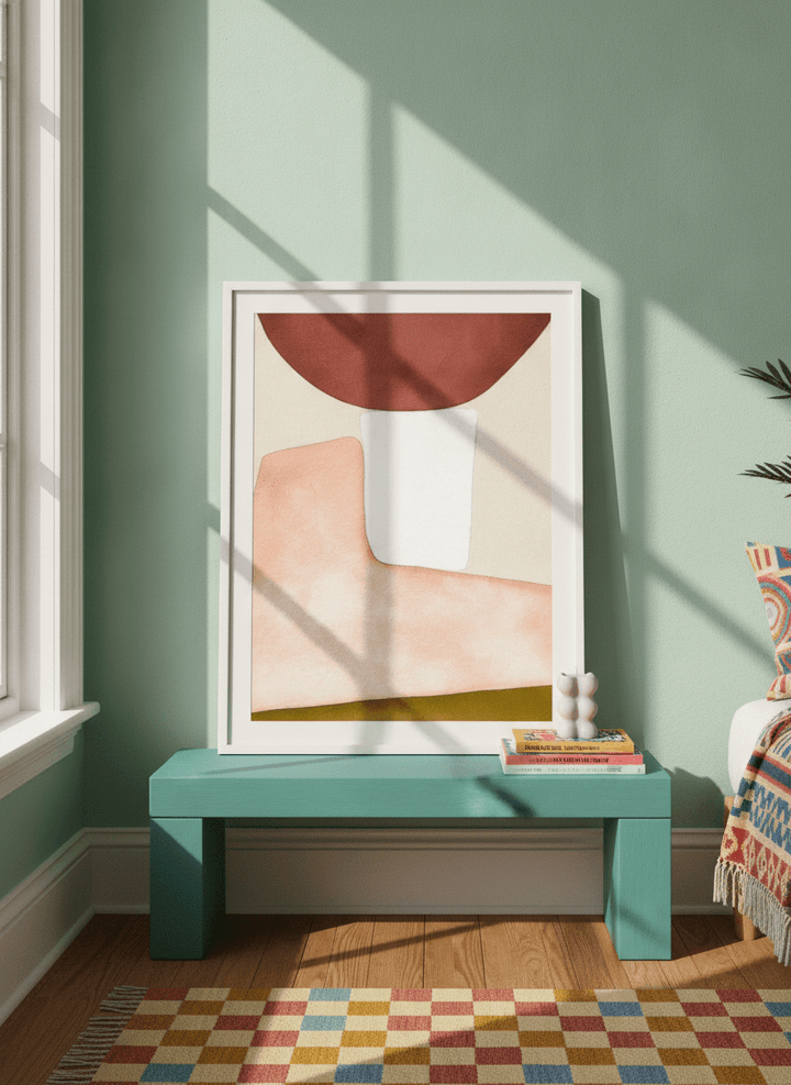 Modern wall art print standing on a side table in a colourful eclectic bedroom