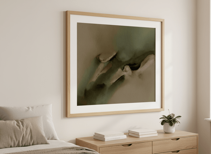 Minimalist artwork displayed in a calm, light-filled bedroom interior