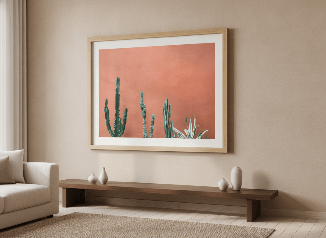 Modern wall art styled above a sofa in a neutral living room