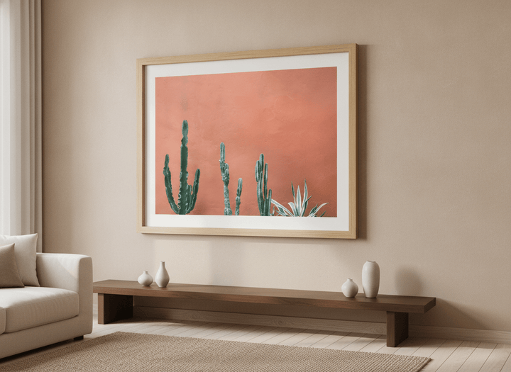 Modern wall art styled above a sofa in a neutral living room